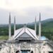 Aerial Drone Sunset Scene of Shah Faisal Mosque is one of the largest Mosques in the World which is situated in Islamabad, Pakistan.